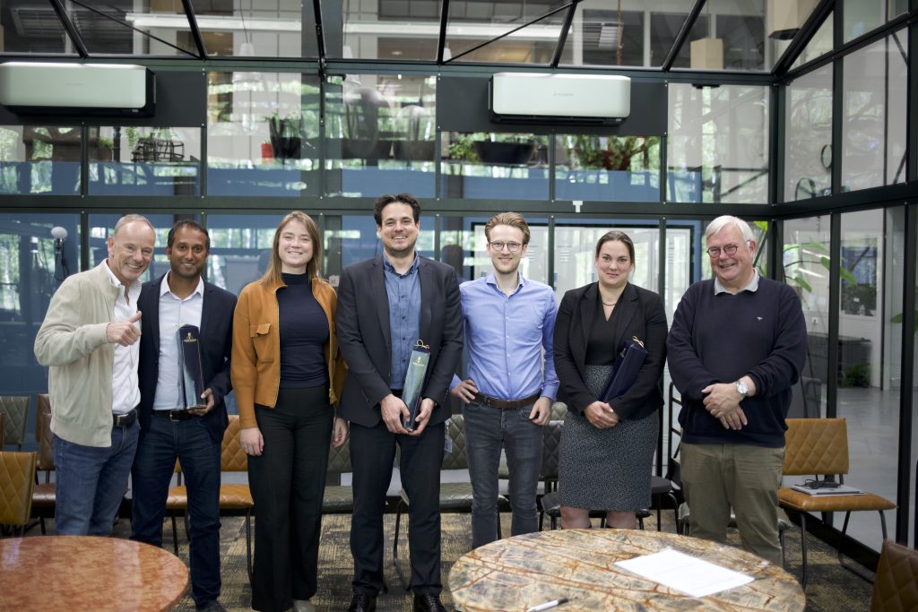inPhocal and its investors celebrating their 2 million investment in the laster tech startup